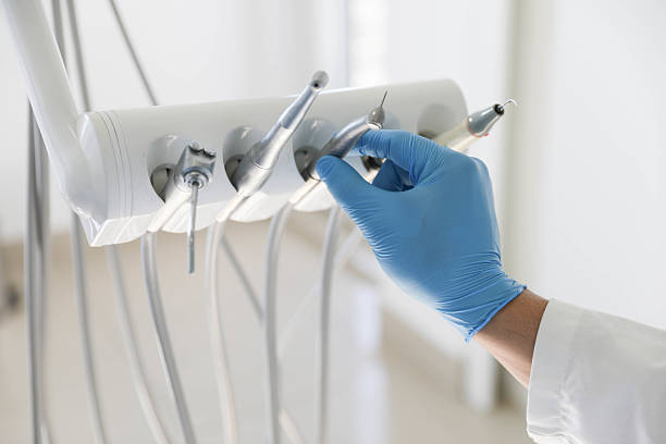 Professional Tooth Extraction technician working in Lake County County, TN